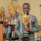 HIGENYI David proudly holding the 2023 Gold Cup.