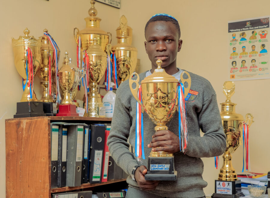 HIGENYI David proudly holding the 2023 Gold Cup.
